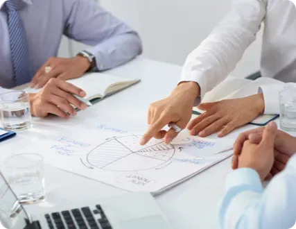 Coworkers looking at a chart.