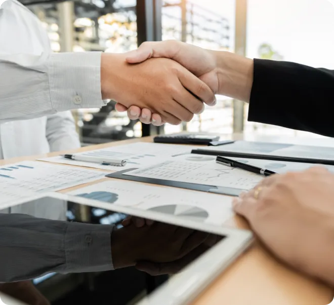 Two businessmen shaking hands.