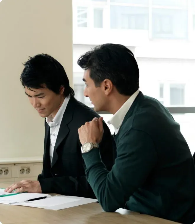 Two business men talking.