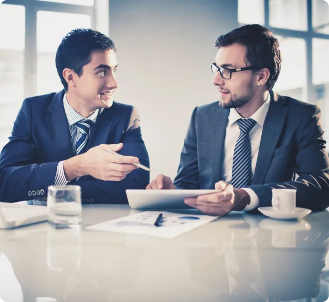 Two business men talking.